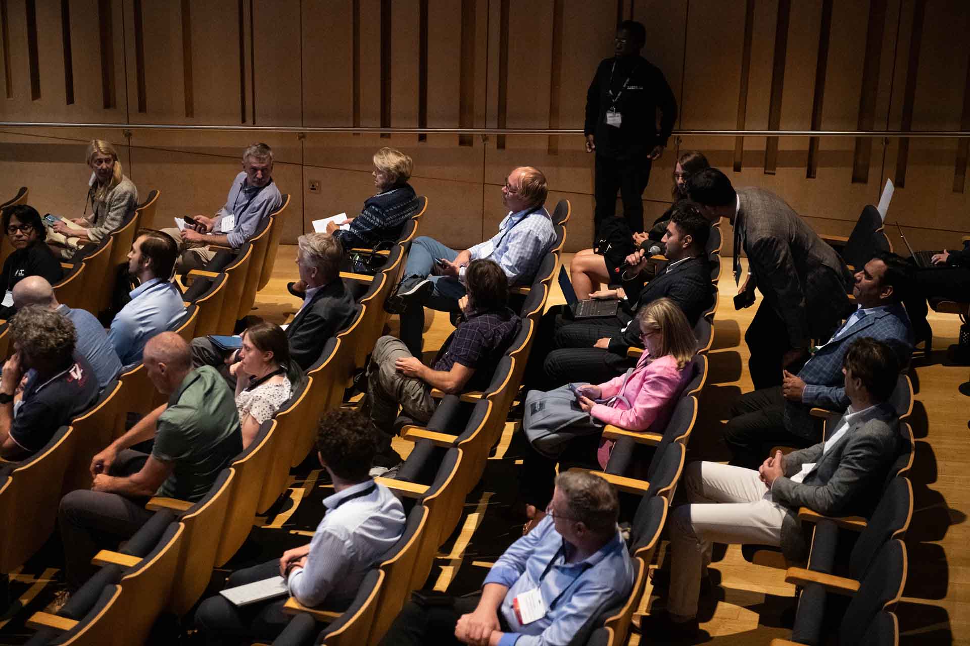 Attendees sitting at event