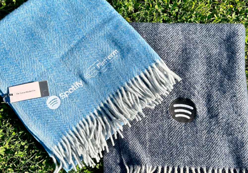 Spotify branded blankets on Grass