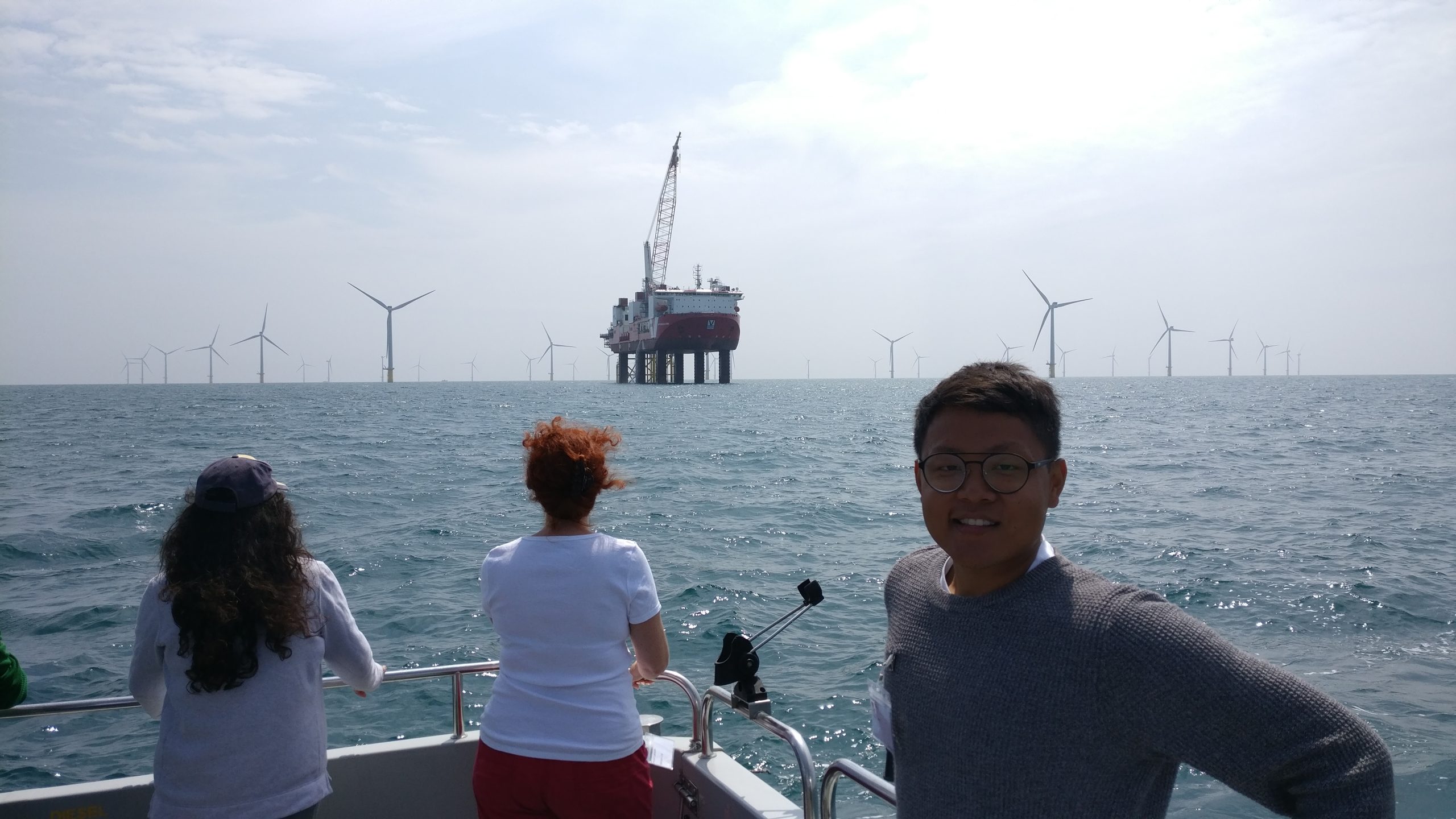Event attendees visiting a working wind farm in July 2018