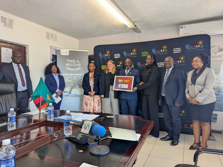 Access Now team signing MOU with Zambia Ministry of Tourism.